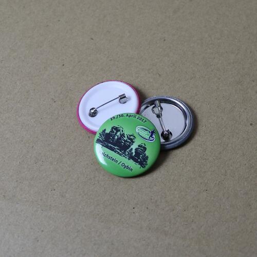 Button mittel image